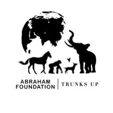 A black and white logo for 'ABRAHAM FOUNDATION | TRUNKS UP' featuring silhouettes of an elephant, lion, and other animals arranged within a globe shape.