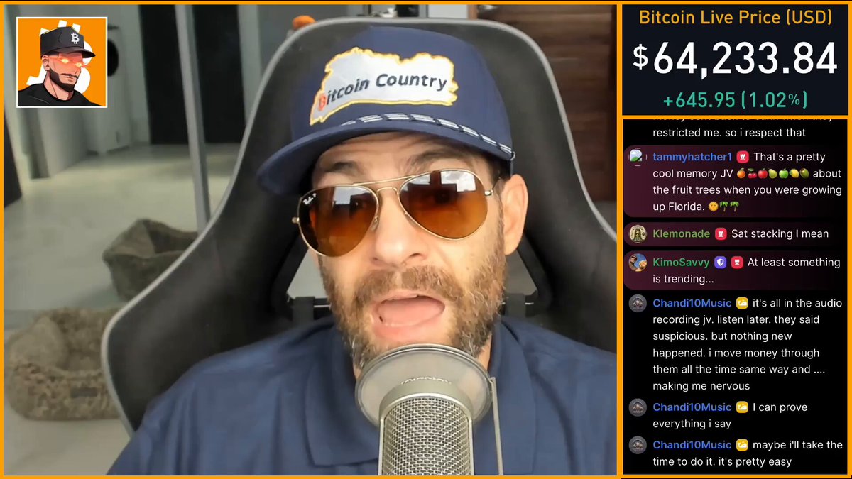 In this image, there is a man wearing sunglasses with a blue hat sitting in a chair and holding a microphone. He appears to be giving an interview-like speech or discussing something related to cryptocurrency, as indicated by the post's title. The image also includes other posts that reference Bitcoin Live Price, and it seems like these discussions are happening over time. This man might have some insights or opinions on Bitcoin, given his position in this conversation, but there could be others who don't see the value yet.