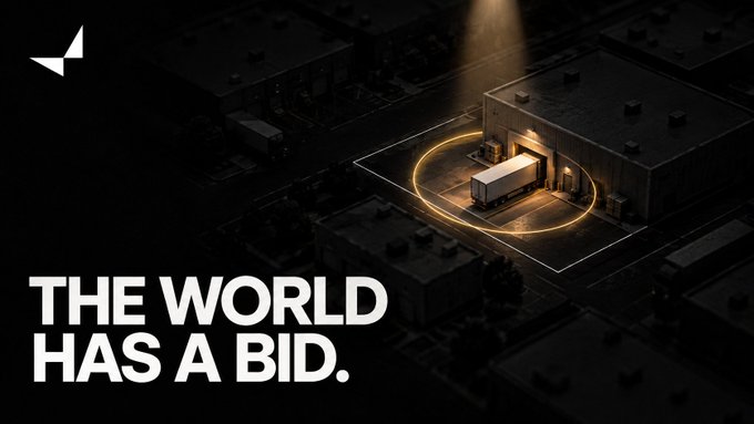 A dark, cinematic promotional image displays the text "THE WORLD HAS A BID." alongside an aerial view of a warehouse illuminated by a spotlight and ring.