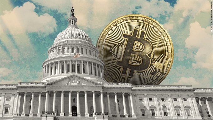 The image shows the U.S. Capitol building alongside a large gold Bitcoin coin against a cloudy sky, visually representing the CFTC's new crypto market regulations being submitted to the White House for review, symbolizing the intersection of government policy and cryptocurrency.