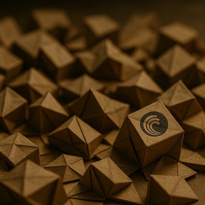A 3D render of scattered brown geometric polyhedral dice or tokens, with one prominently displaying a crescent wave logo resembling the Fantom (FTM) cryptocurrency symbol.