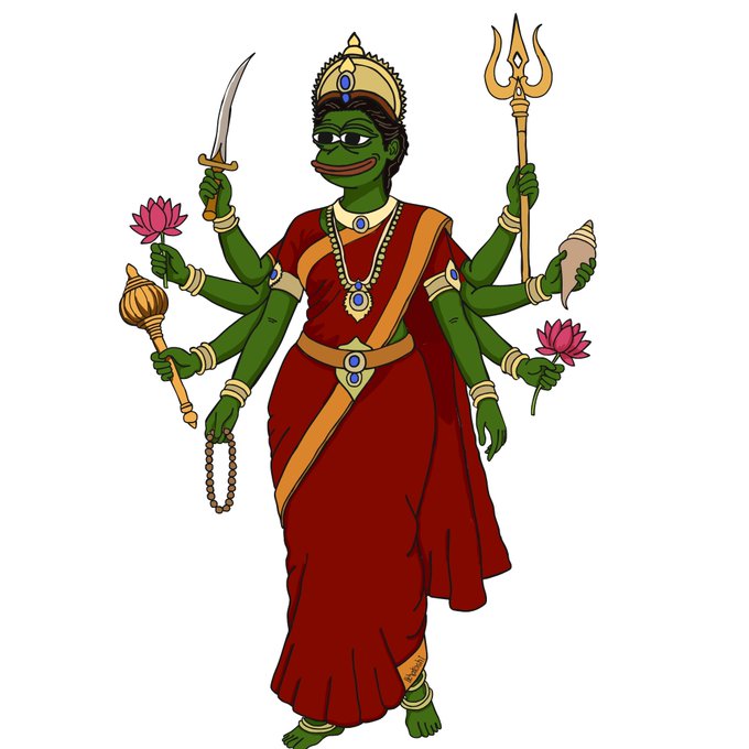 A cartoon illustration of a green, multi-armed Hindu goddess figure (resembling Pepe the Frog) wearing a red sari and crown, holding various items including a trident, sword, lotus flowers, a conch shell, and prayer beads.