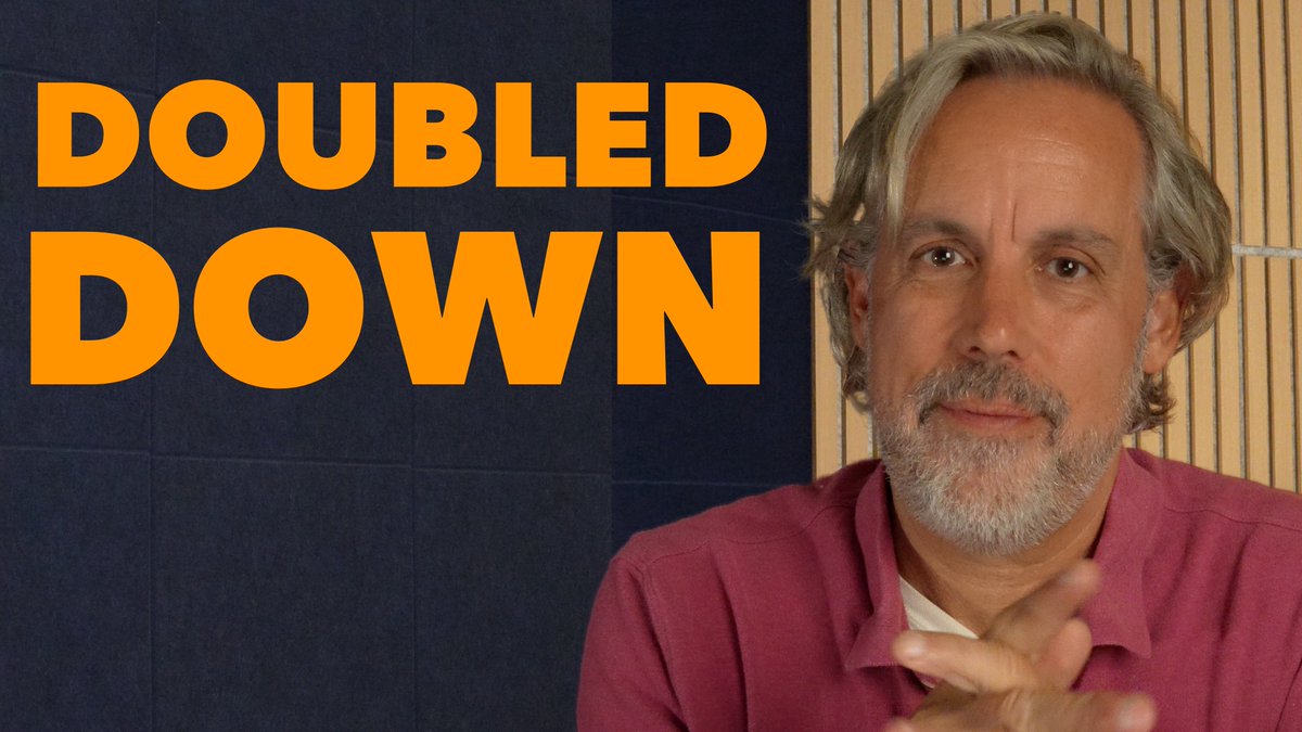 A man in a maroon polo shirt appears on the right side of the frame against a wooden slatted background, gesturing with his fingers, while bold orange text reading "DOUBLED DOWN" is displayed on the left against a dark blue background—suggesting the image is a thumbnail for a video reinforcing a bullish position on Strategy's STRC stock as it rebounds toward its $99-$100 target range.