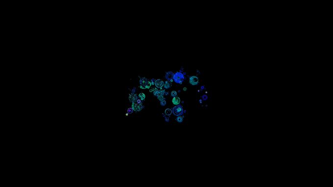 Glowing blue and green bubbles cluster together in the center of a pitch-black background.