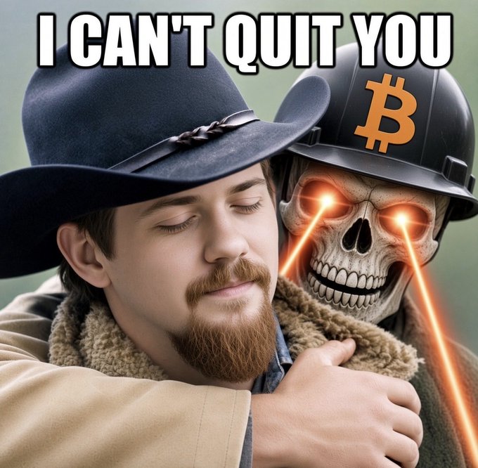A meme featuring a cowboy being hugged by a fiery-eyed skull wearing a Bitcoin helmet, with the text "I CAN'T QUIT YOU".