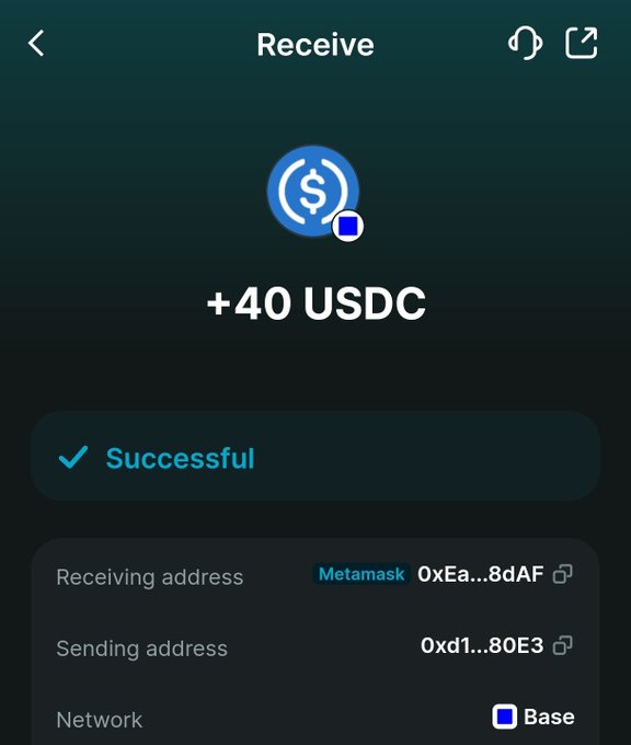 A mobile app screen showing a successful crypto transaction receiving '+40 USDC' on the Base network, with details for the receiving Metamask address and sending address visible.