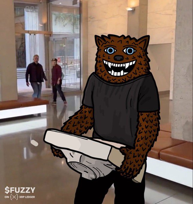 An animated illustration of a brown furry character with a wide toothy grin wearing a black t-shirt and white pants, superimposed over a photo of a building lobby, with '$FUZZY' text in the corner.
