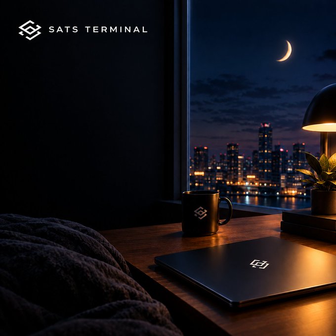 A moody nighttime lifestyle image for 'SATS TERMINAL' featuring a desk with a branded mug and laptop by a window overlooking a city skyline under a crescent moon.