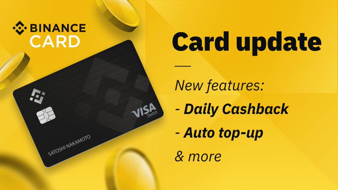 A yellow promotional graphic for Binance Card announcing new features including 'Daily Cashback', 'Auto top-up', and more, displaying a black card issued by Visa with the name 'Satoshi Nakamoto'.
