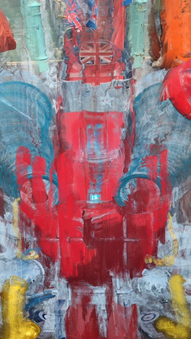An abstract painting depicts a red Formula 1-style race car with a British Union Jack logo on its steering wheel, rendered in bold red, blue, gray, and yellow brushstrokes.