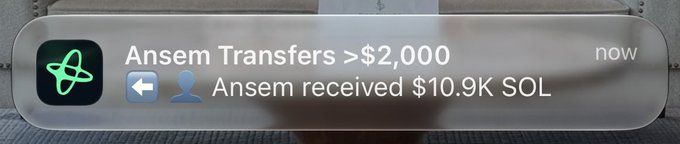 A digital notification banner reads 'Ansem Transfers >$2,000 now' and 'Ansem received $10.9K SOL'.