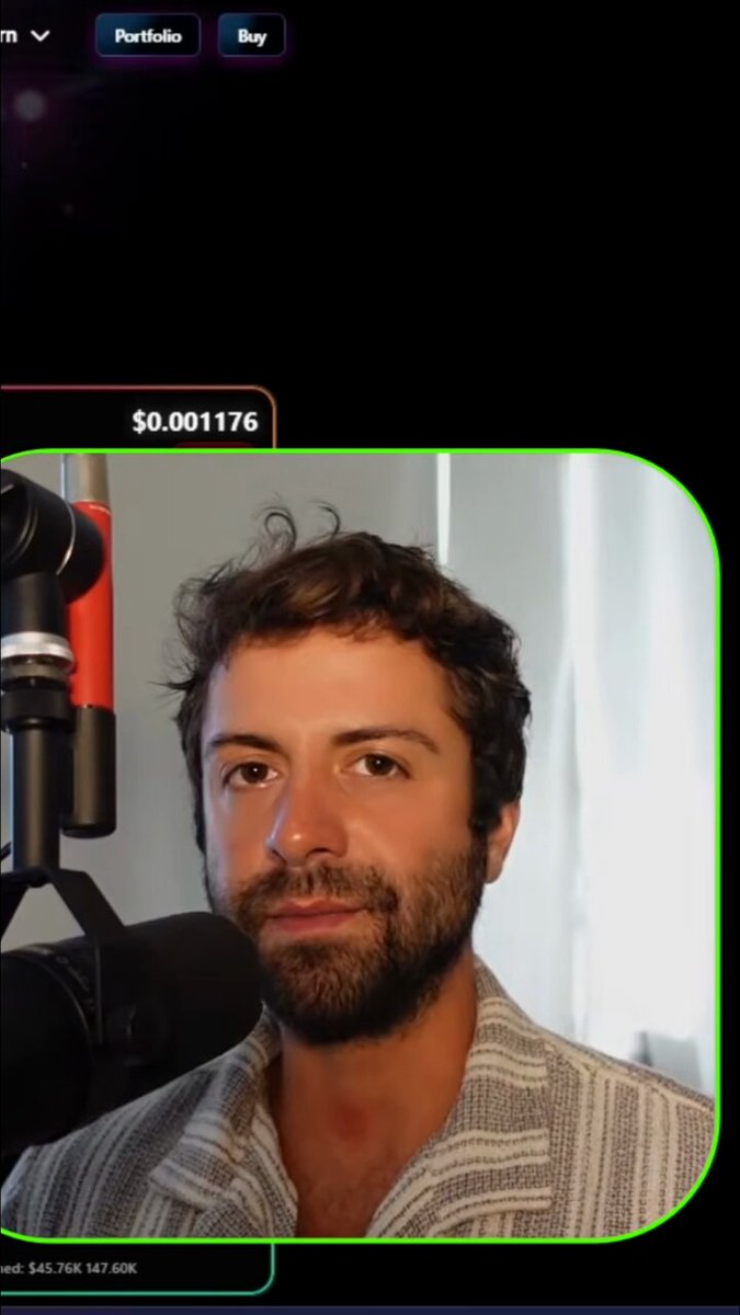 urn of a man with a beard and mustache, wearing a striped shirt, stands against a black background with the text "Portfolio" and "Buy".