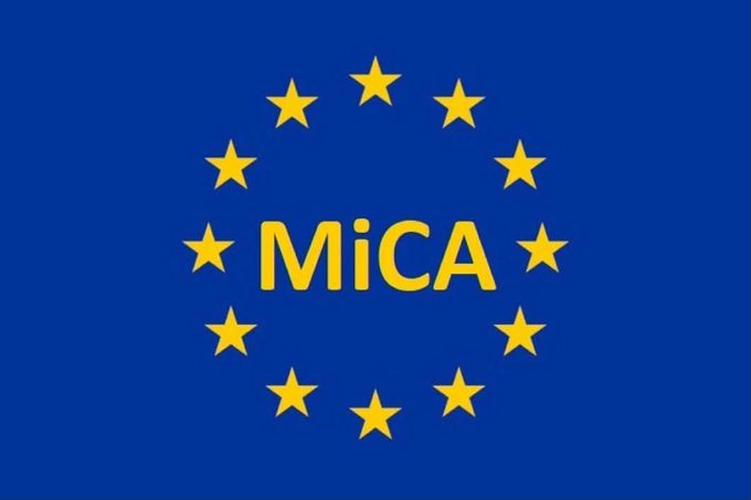 A blue flag-style design featuring yellow stars arranged in a circle with the text "MiCA" in the center, resembling the European Union flag design.