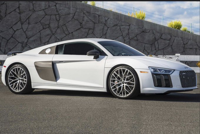 The image features a sleek white Audi R8, though the post describes it as "Suzuka Gray," likely an older listing or color discrepancy in a sale advertisement for a 2017 Audi R8 AWD V10 Plus with 15k miles, asking 180+ with crypto accepted.