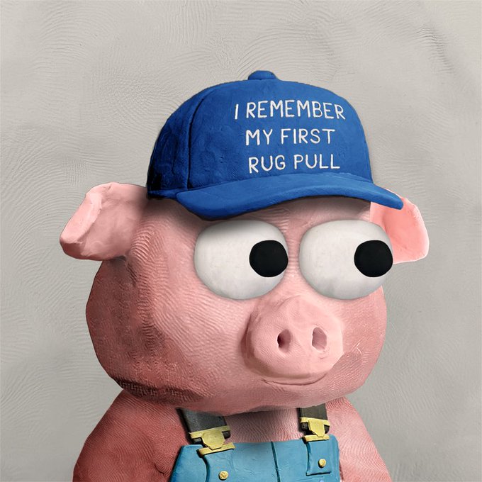 A pink pig figurine wearing blue overalls and a blue baseball cap with the text "I REMEMBER MY FIRST RUG PULL" smiles against a textured gray background, playing on crypto slang for a scam exit where developers abandon a project after attracting investment.