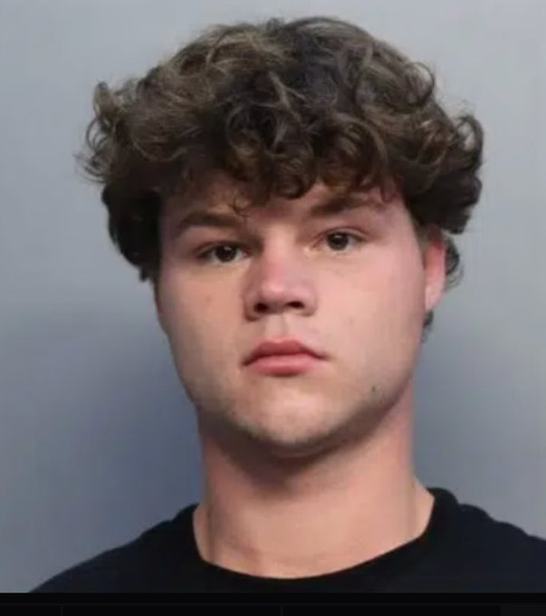 A young man with curly brown hair is shown in what appears to be a mugshot-style photo with a neutral expression against a plain gray background, likely used as a meme reference in the post promoting the "$jack" meme token.