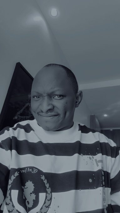 A man with a shaved head, wearing a black and white striped shirt, makes a squinting, determined facial expression. The image visually reinforces the post's commitment, as his recently shaved head symbolizes his pledge not to cut his hair again until $BNB reaches a new all-time high.