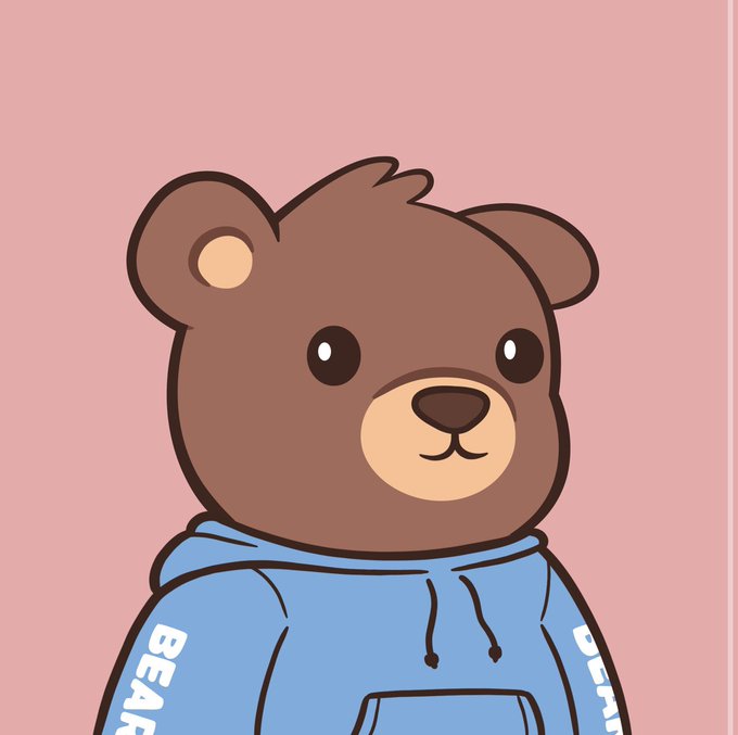 A cartoon brown bear wearing a blue hoodie on a pink background, with partial white text including “BEA…” and “DREA…” on the sleeves.