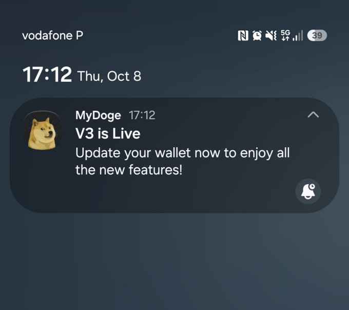 A mobile phone notification screenshot from "MyDoge" at 17:12 announcing that "V3 is Live" and prompting users to update their wallet for new features.