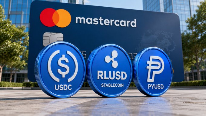 The image features a blue Mastercard sign with three cryptocurrency symbols - a $USDC, a RLPUSD, and a PYUSD stablecoin symbol. The text on the sign indicates that Mastercard is rolling out on-chain settlement support for regulated stablecoins like USDC, RLPUSD, and PYUSD across major blockchain networks such as Ethereum, Solana, Base, and Arbitrum.