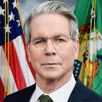 Official portrait of Jerome Powell, Chairman of the Federal Reserve, standing in front of the American flag and the Federal Reserve seal.